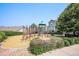 Community playground surrounded by mature landscape at 9434 Ashbury Cir # 204, Parker, CO 80134