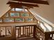 Open loft area with large windows and mountain views at 4924 S Indian Trl, Evergreen, CO 80439
