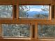Stunning mountain views through large windows at 4924 S Indian Trl, Evergreen, CO 80439