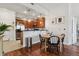 Cozy dining area adjacent to the kitchen, ideal for intimate meals at 1700 N Emerson St # 305, Denver, CO 80218
