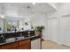 Open kitchen design flowing into the living area, perfect for entertaining and modern living at 1700 N Emerson St # 305, Denver, CO 80218