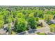 Inviting home on a corner lot with mature trees offering shade and curb appeal at 3014 E Fremont Dr, Centennial, CO 80122