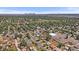 Panoramic aerial view showcasing the neighborhood and city skyline in the distance at 1742 S Alcott St, Denver, CO 80219