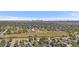 Scenic aerial view of a residential neighborhood with the Denver skyline in the distance at 1742 S Alcott St, Denver, CO 80219
