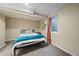 Cozy bedroom with a comfortable bed and soft carpeting, offering a serene retreat at 1742 S Alcott St, Denver, CO 80219