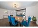 Inviting dining room with views into the modern kitchen and living room area at 1742 S Alcott St, Denver, CO 80219