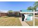 Charming single-story home with well-maintained lawn and appealing curb appeal at 1742 S Alcott St, Denver, CO 80219