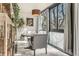 Cozy dining area with natural light and views at 1050 N Corona St # 206, Denver, CO 80218