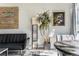 Cozy living room featuring stylish decor and comfortable seating arrangement at 1050 N Corona St # 206, Denver, CO 80218