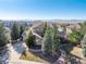 Stunning aerial view of the home highlighting its landscaping and proximity to open spaces at 3125 Starling Ct, Castle Rock, CO 80109