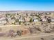 Aerial view of a residential area with well-maintained homes and lush landscaping at 3125 Starling Ct, Castle Rock, CO 80109