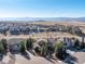 Expansive aerial view showcases the property and its beautiful surroundings with mountain views at 3125 Starling Ct, Castle Rock, CO 80109