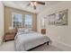 Bedroom with a platform bed and a view of the en suite bathroom at 3125 Starling Ct, Castle Rock, CO 80109