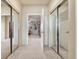 Hallway with mirrored closet doors leading to additional rooms at 3125 Starling Ct, Castle Rock, CO 80109