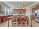 Kitchen with dark wood cabinets, stainless steel appliances, and a large island at 3125 Starling Ct, Castle Rock, CO 80109