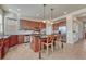 Spacious kitchen features a center island, stainless steel appliances, and rich wood cabinetry at 3125 Starling Ct, Castle Rock, CO 80109