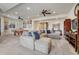 Large, open living room with comfortable seating, a pool table, and great lighting at 3125 Starling Ct, Castle Rock, CO 80109