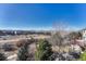 A scenic neighborhood view with houses, mountains and a clear blue sky in the background at 3125 Starling Ct, Castle Rock, CO 80109