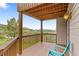 Enjoy the wooden deck with mountain views, with natural light to enjoy the outdoor space at 5979 Willow Springs Dr, Morrison, CO 80465