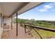 Inviting deck offering scenic views of rolling hills and lush greenery at 5979 Willow Springs Dr, Morrison, CO 80465