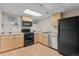 Well-equipped kitchen with modern appliances, light wood cabinetry, and ample counter space at 5979 Willow Springs Dr, Morrison, CO 80465