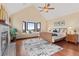 Relaxing main bedroom with a cozy sitting nook by the bay window, next to the fireplace at 5979 Willow Springs Dr, Morrison, CO 80465