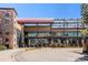 Apex Center exterior view showcasing its modern architecture and prominent signage on a clear day at 11744 W 71St Pl, Arvada, CO 80004