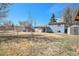 Large backyard with grass, shed and other various equipment at 11744 W 71St Pl, Arvada, CO 80004