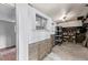 Unfinished basement for storage with exposed block foundation and small windows at 4051 S Cherokee St, Englewood, CO 80110