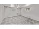 Spacious basement area with carpet flooring and neutral walls at 4051 S Cherokee St, Englewood, CO 80110