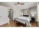 Comfortable bedroom with hardwood floors and ceiling fan at 4051 S Cherokee St, Englewood, CO 80110
