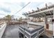 Rooftop deck features wood pergola, lounge area and neighborhood views at 4051 S Cherokee St, Englewood, CO 80110