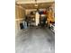 Spacious garage interior with ample storage space, providing secure parking and organizational options at 19049 E Warren Dr # 105, Aurora, CO 80013