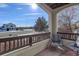 Relaxing covered porch with comfortable seating and view of the neighborhood at 19049 E Warren Dr # 105, Aurora, CO 80013
