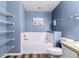Bright bathroom featuring a soaking tub, new floors, and ample storage space at 9311 Amison Cir # 201, Parker, CO 80134