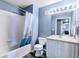 This bathroom features a shower and bathtub combination with updated vanity and mirror at 9311 Amison Cir # 201, Parker, CO 80134