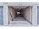 This garage is a long tandem style with drywall and lighting at 9311 Amison Cir # 201, Parker, CO 80134