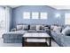 Comfortable living room featuring a large gray sectional and contemporary decor at 9311 Amison Cir # 201, Parker, CO 80134