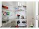 Functional pantry with wire shelving, providing ample storage space for kitchen essentials at 9311 Amison Cir # 201, Parker, CO 80134