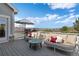 Outdoor deck featuring comfortable seating, perfect for relaxation and enjoying the surrounding views at 1658 Glade Gulch Rd, Castle Rock, CO 80104