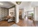 Elegant living room featuring hardwood floors and an open-concept design with lots of natural light at 1658 Glade Gulch Rd, Castle Rock, CO 80104
