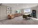 Functional home office with built-in desk, stylish decor, and a window offering natural light at 1658 Glade Gulch Rd, Castle Rock, CO 80104