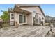 Wooden deck in backyard with easy access to home through sliding glass door at 2209 S Flanders St, Aurora, CO 80013