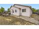 Backyard with a wooden deck and space to add your personal touch at 2209 S Flanders St, Aurora, CO 80013