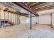 Unfinished basement with exposed beams and walls ready for customization at 2209 S Flanders St, Aurora, CO 80013