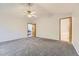 Large main bedroom with bathroom access, neutral colors and new carpets at 2209 S Flanders St, Aurora, CO 80013