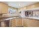 Kitchen with granite countertops, stainless steel appliances, and ample cabinet space at 16084 E Lehigh Cir, Aurora, CO 80013