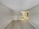 Bedroom with access to bathroom and accent wall at 1723 Robb St # 31, Lakewood, CO 80215