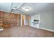 Bedroom with carpet, exposed pipes, and a decorative built-in cabinet at 2607 E 14Th Ave, Denver, CO 80206