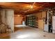 Unfinished basement with exposed ceiling and utilities; awaits customization and personalization at 962 S Beech St, Lakewood, CO 80228